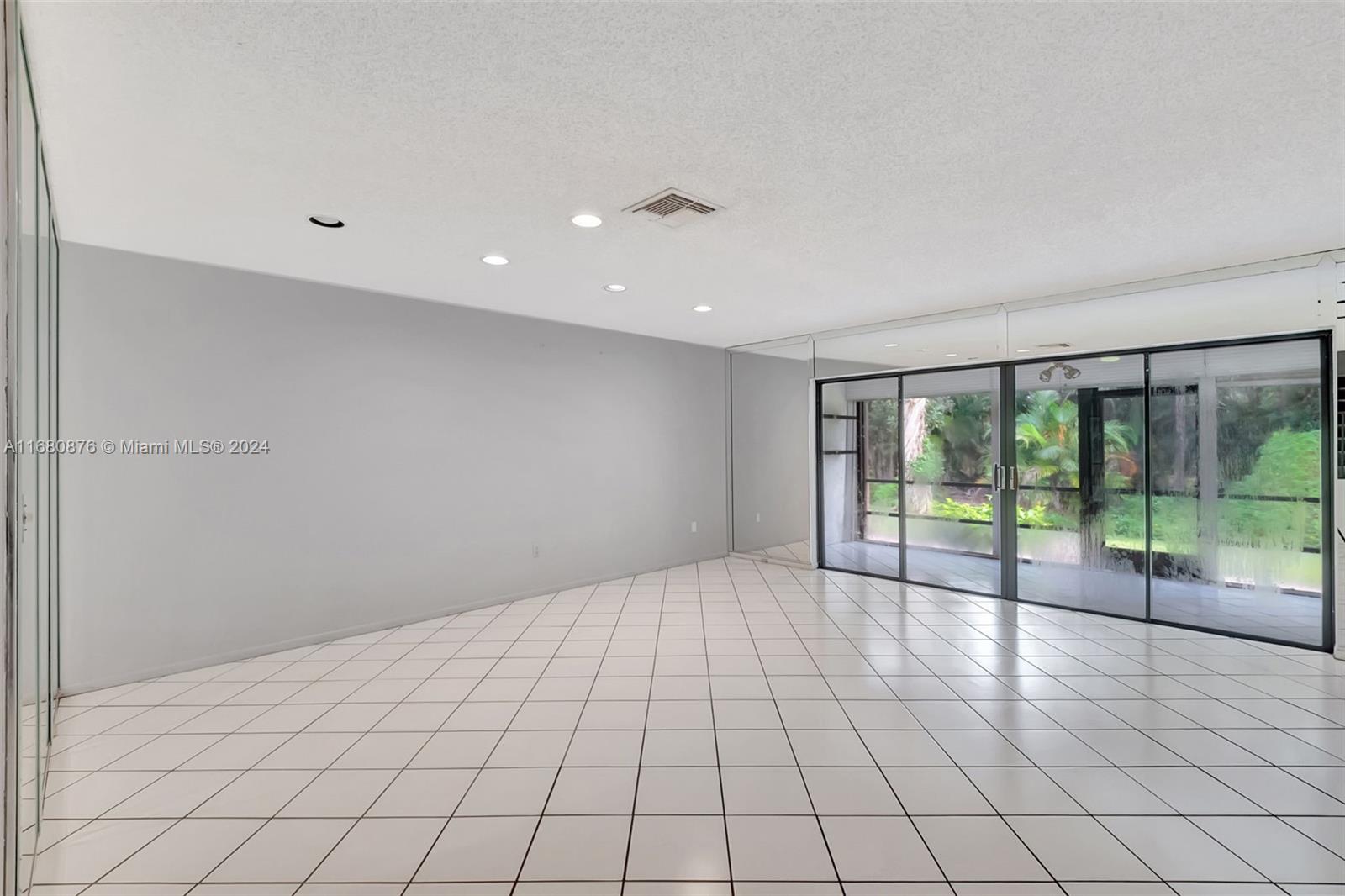 21864 Arriba Real, Unit 3E Boca Raton, FL 33433 - Photo 12 of 61 a view of an empty room and window