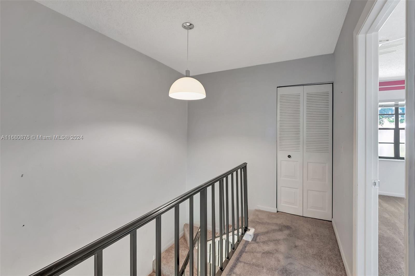21864 Arriba Real, Unit 3E Boca Raton, FL 33433 - Photo 25 of 61 a view of a hallway to rooms