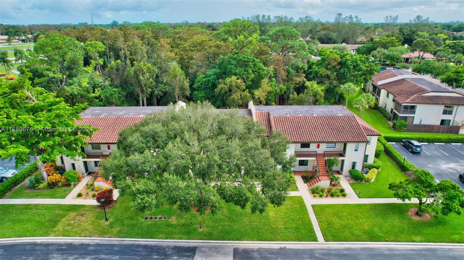 21864 Arriba Real, Unit 3E Boca Raton, FL 33433 - Photo 3 of 61 an aerial view of a house