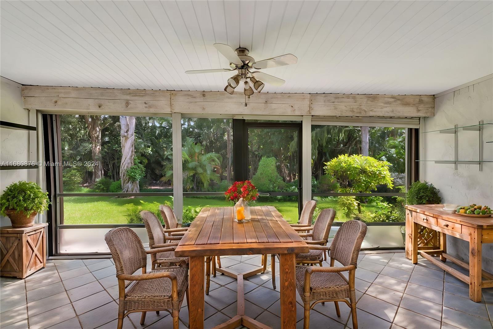 21864 Arriba Real, Unit 3E Boca Raton, FL 33433 - Photo 36 of 61 a view of a dining room with furniture window and outside view