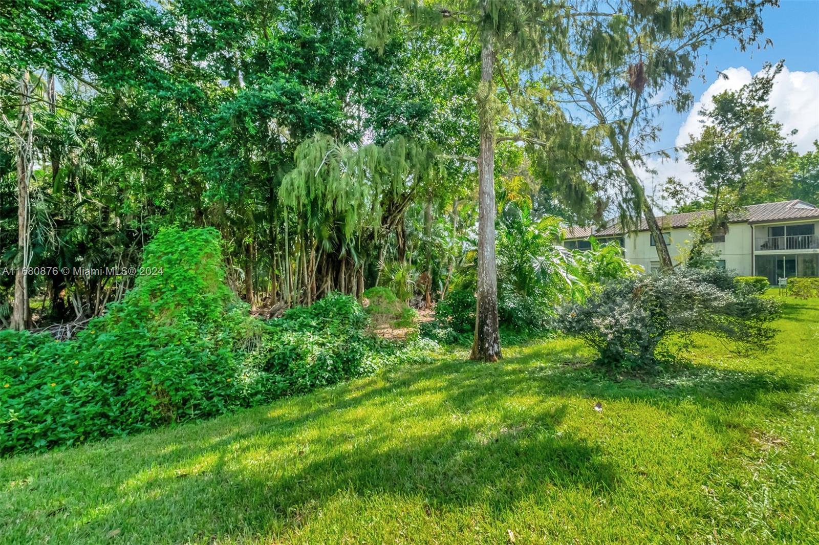 21864 Arriba Real, Unit 3E Boca Raton, FL 33433 - Photo 42 of 61 a view of backyard with green space