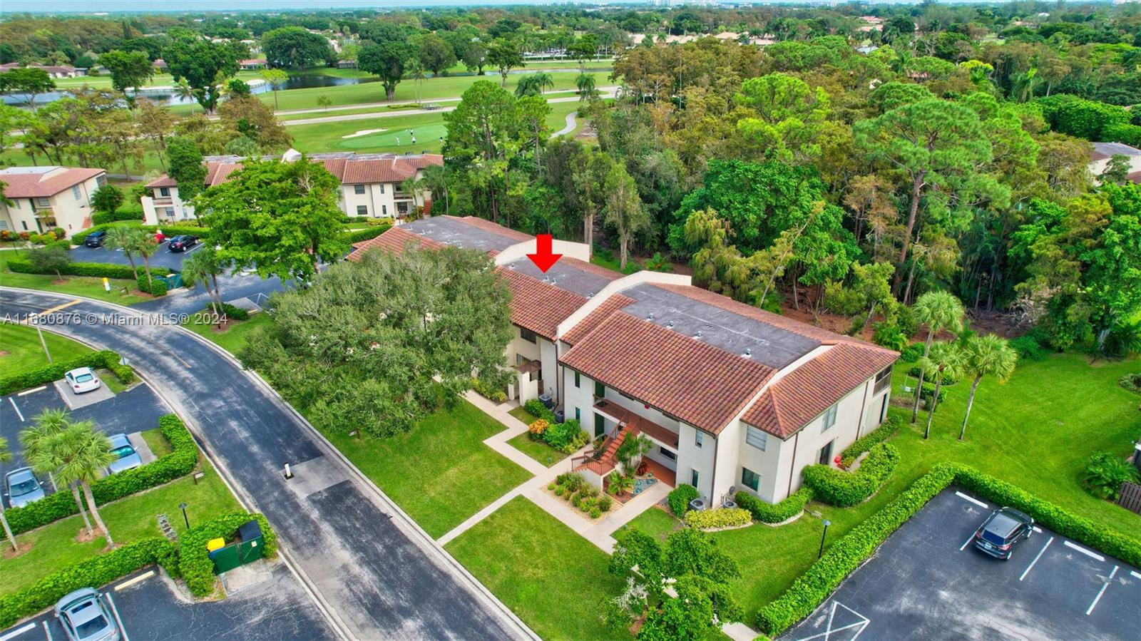 21864 Arriba Real, Unit 3E Boca Raton, FL 33433 - Photo 5 of 61 a aerial view of a house with a garden and lake view
