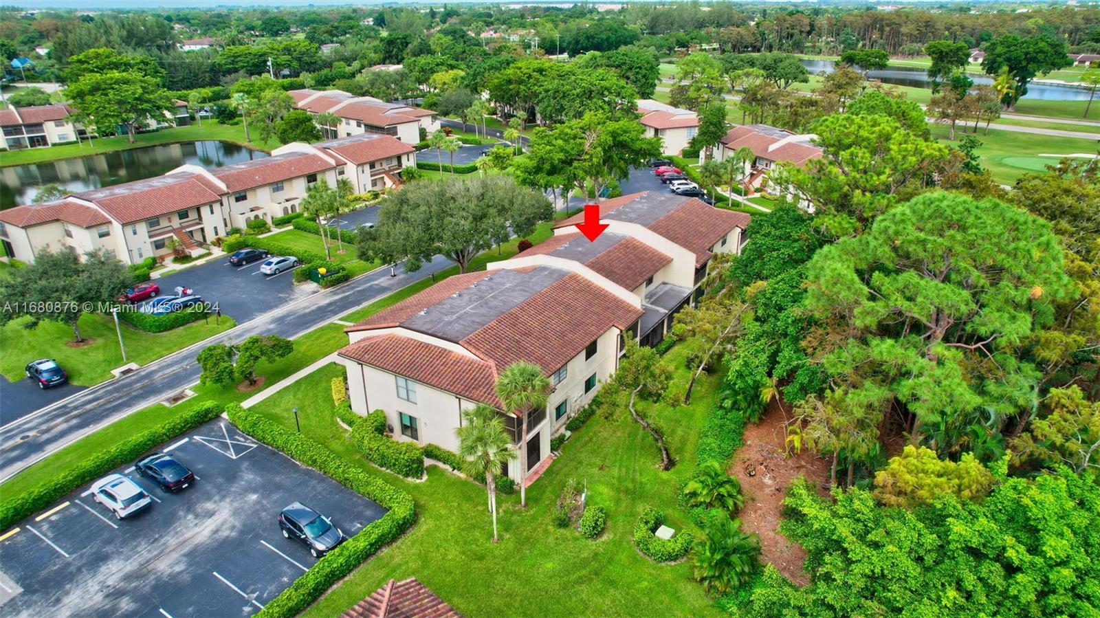 21864 Arriba Real, Unit 3E Boca Raton, FL 33433 - Photo 6 of 61 an aerial view of multiple houses with yard