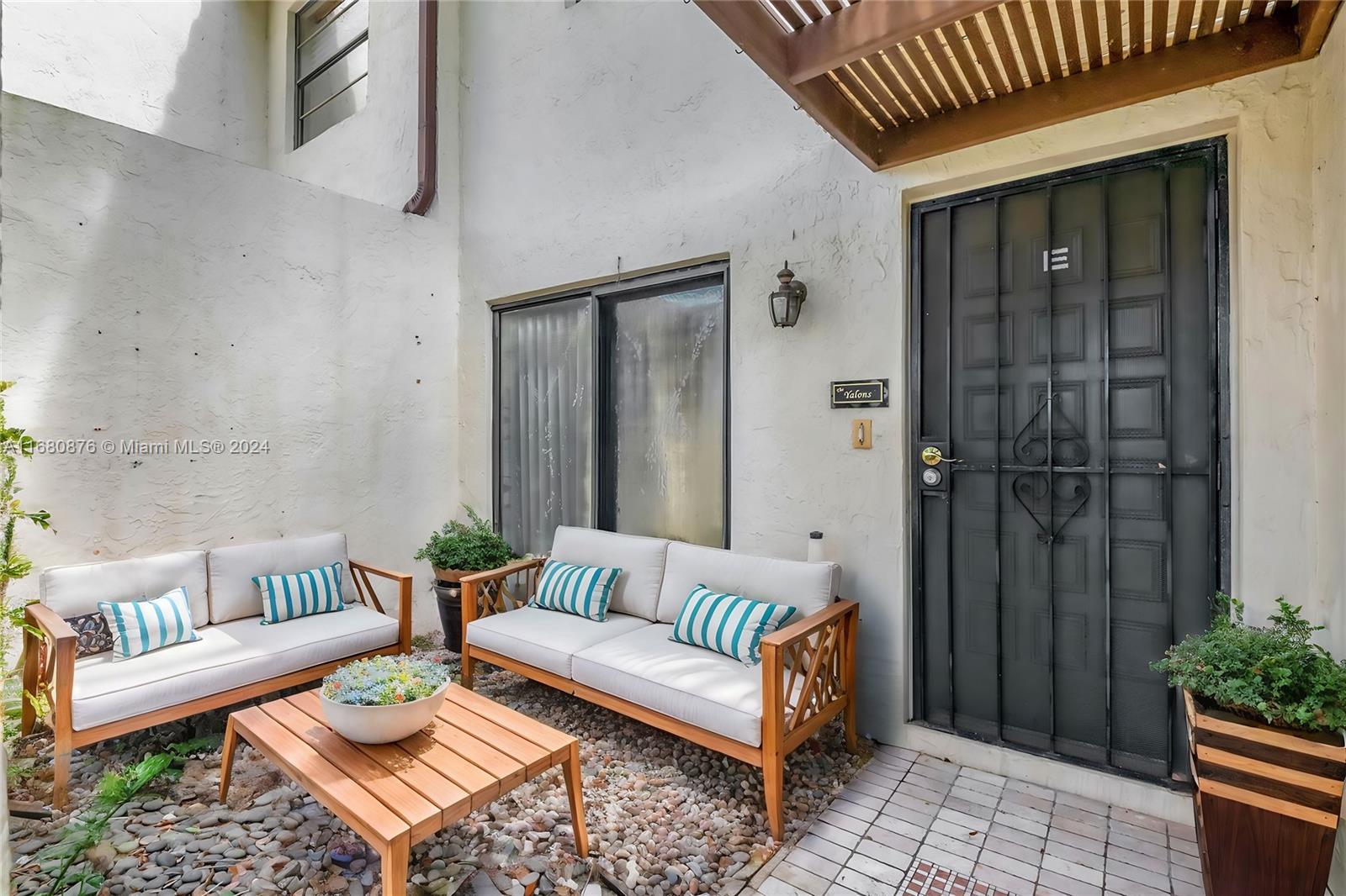 21864 Arriba Real, Unit 3E Boca Raton, FL 33433 - Photo 8 of 61 a outdoor space with patio furniture