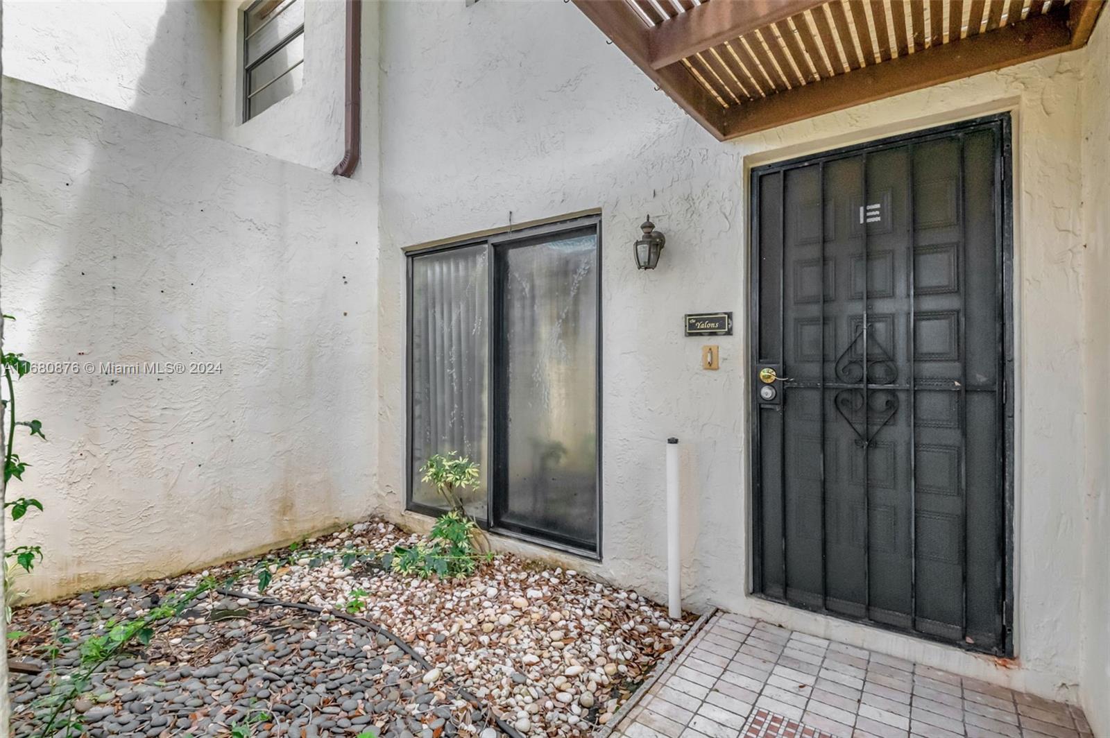 21864 Arriba Real, Unit 3E Boca Raton, FL 33433 - Photo 9 of 61 a view of a wooden door