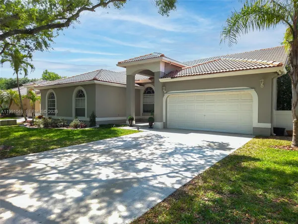 $705,000 | 5318 Northwest 57th Avenue, Coral Springs, FL 33067