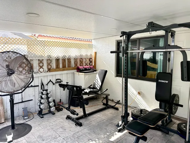 a view of a room with gym equipment