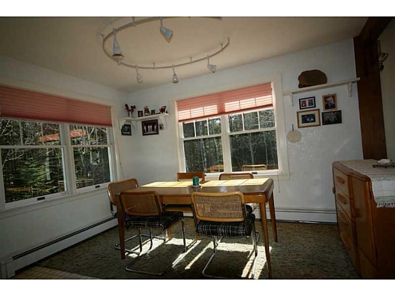893 Ocean Point Road Boothbay, ME 04544 - Photo 5 of 14 Dining Room. The dining room, with a...