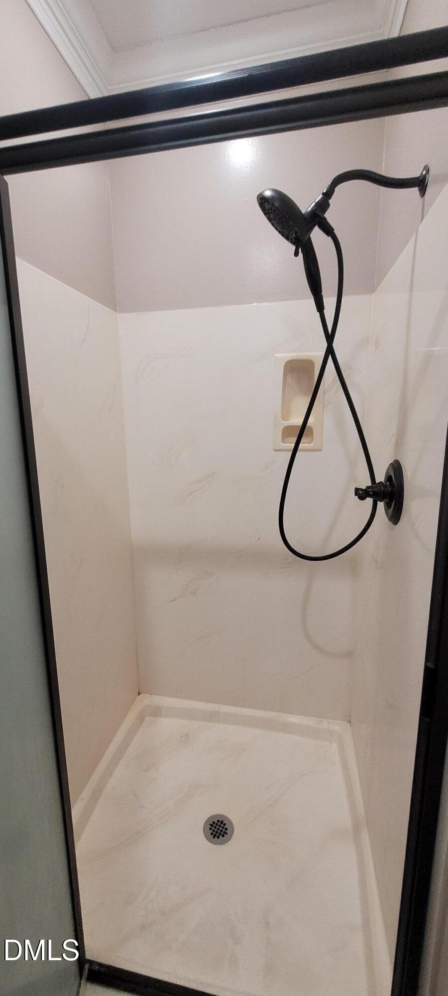 226 Fletcher Ridge Road Timberlake, NC 27583 - Photo 15 of 30 a bathroom with a shower