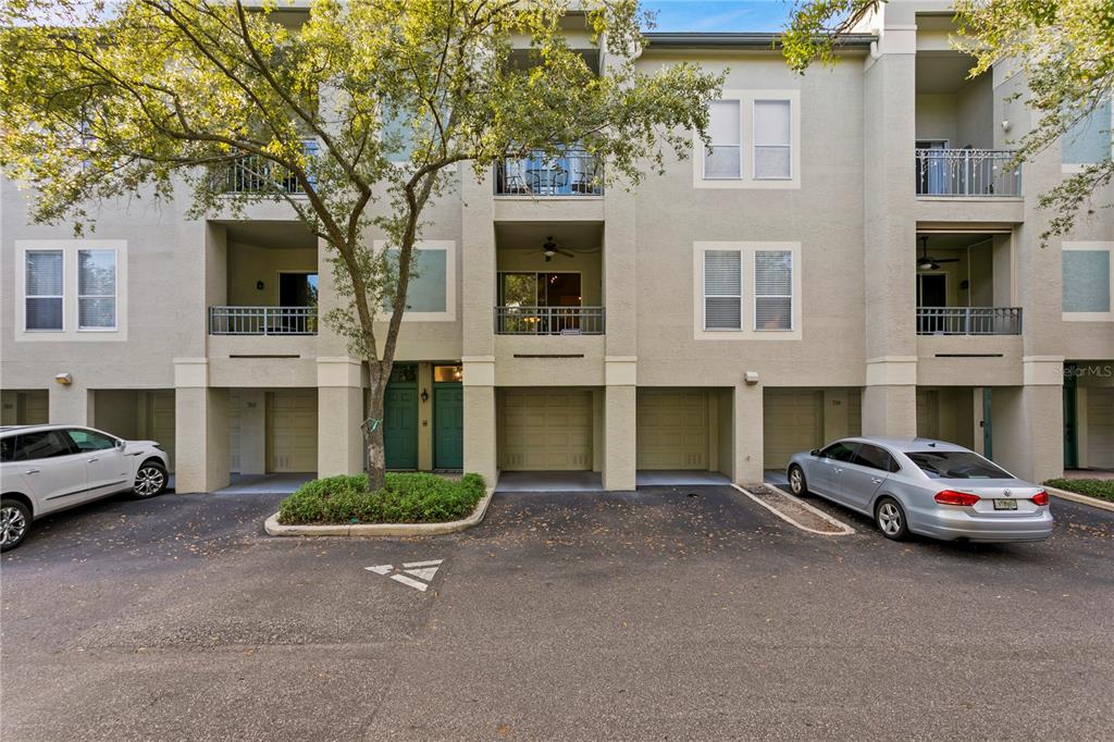 Welcome Home to your 2 car garage condo