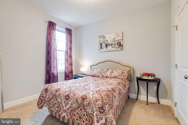 a room with furniture and a wooden floor