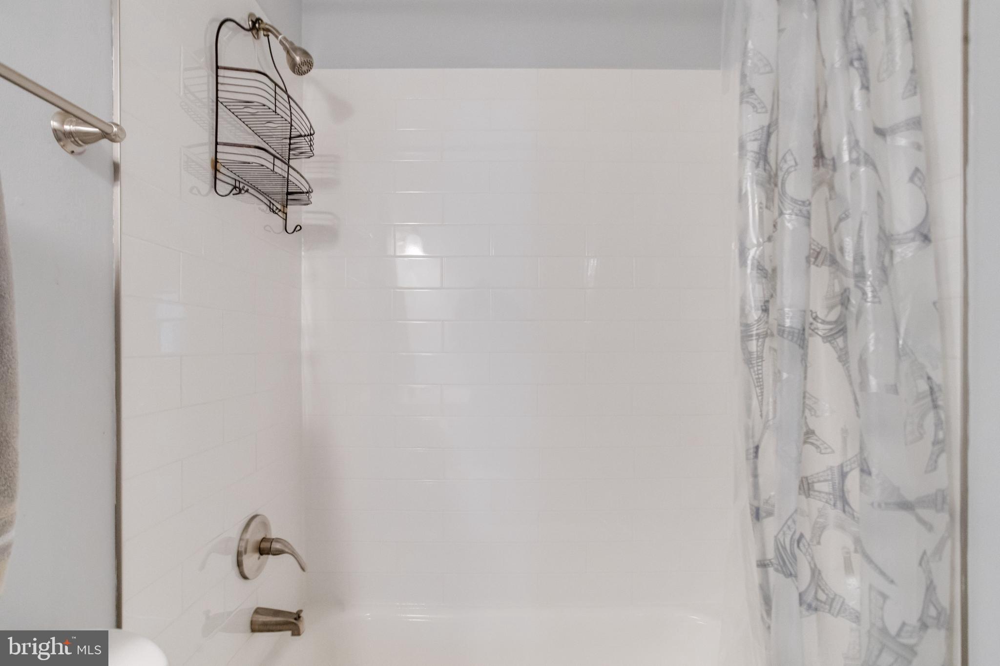 708 Hyde Park Road Essex, MD 21221 - Photo 43 of 65 a bathroom with a shower
