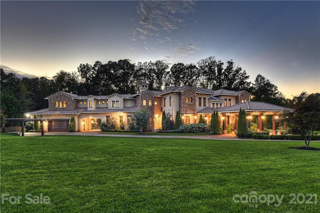 21123 Torrence Chapel Road Cornelius, NC 28031 - Photo 1 of 35 a front view of a house with a yard