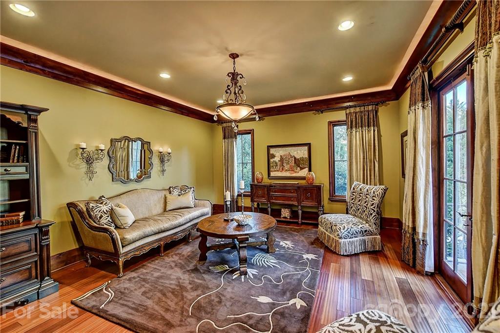 21123 Torrence Chapel Road Cornelius, NC 28031 - Photo 18 of 35 a living room with furniture and a window