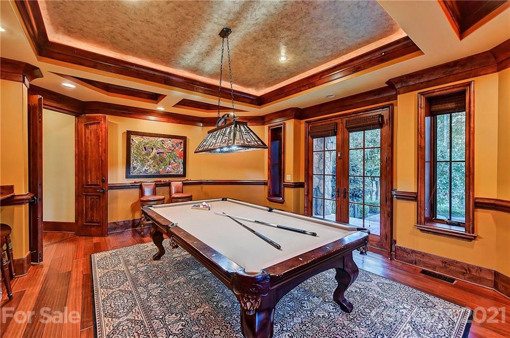 21123 Torrence Chapel Road Cornelius, NC 28031 - Photo 19 of 35 a room with pool table and windows