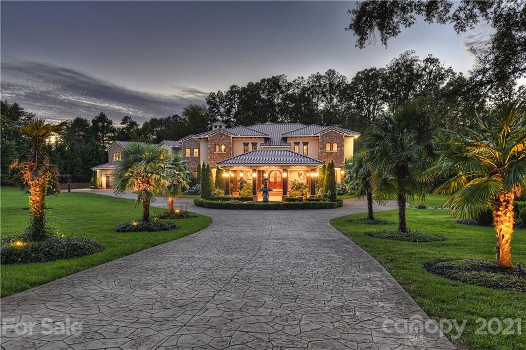 21123 Torrence Chapel Road Cornelius, NC 28031 - Photo 2 of 35 a view of a park with large trees