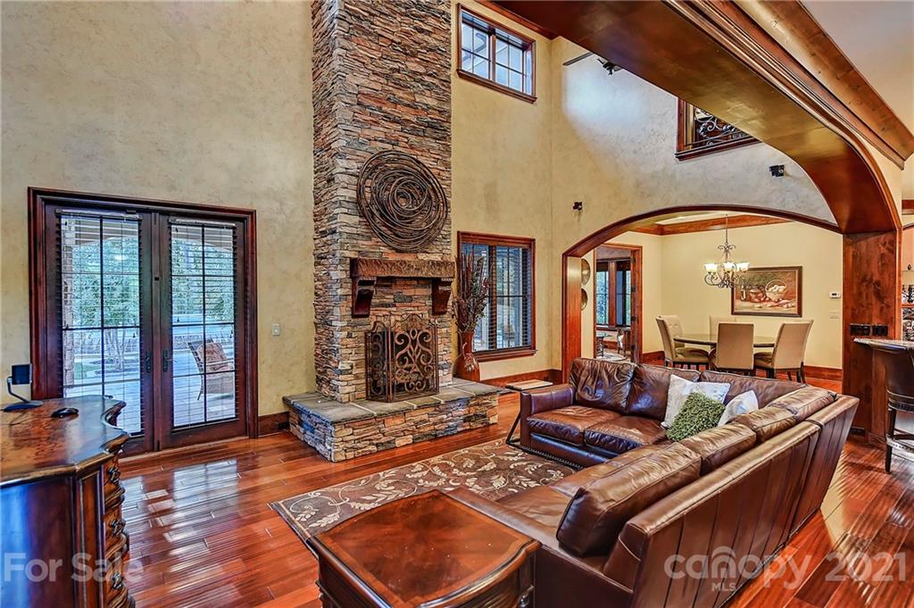 21123 Torrence Chapel Road Cornelius, NC 28031 - Photo 23 of 35 a living room with furniture and large windows