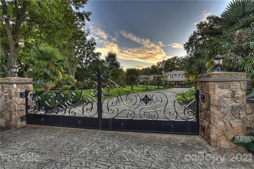 21123 Torrence Chapel Road Cornelius, NC 28031 - Photo 3 of 35 a street sign on a sidewalk
