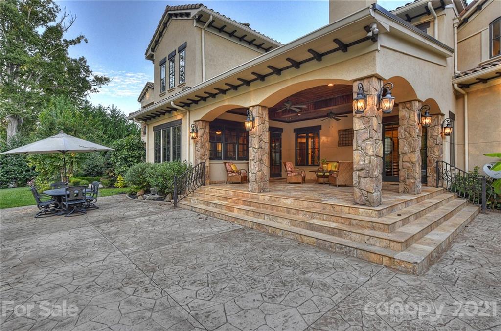 21123 Torrence Chapel Road Cornelius, NC 28031 - Photo 32 of 35 a view of a building with a patio