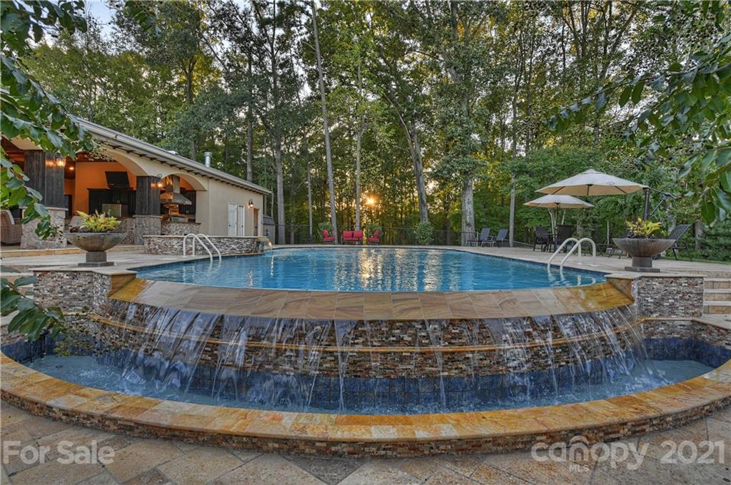 21123 Torrence Chapel Road Cornelius, NC 28031 - Photo 6 of 35 a view of a house with backyard and sitting area