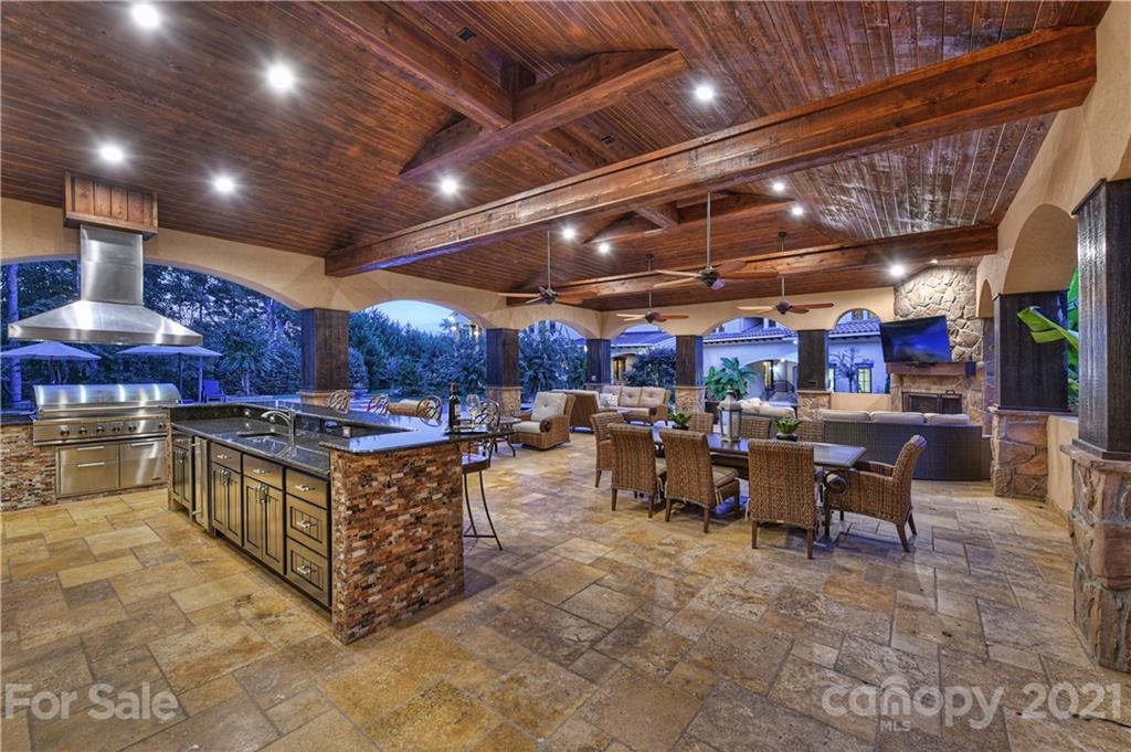 21123 Torrence Chapel Road Cornelius, NC 28031 - Photo 7 of 35 a area with lots of table and chairs