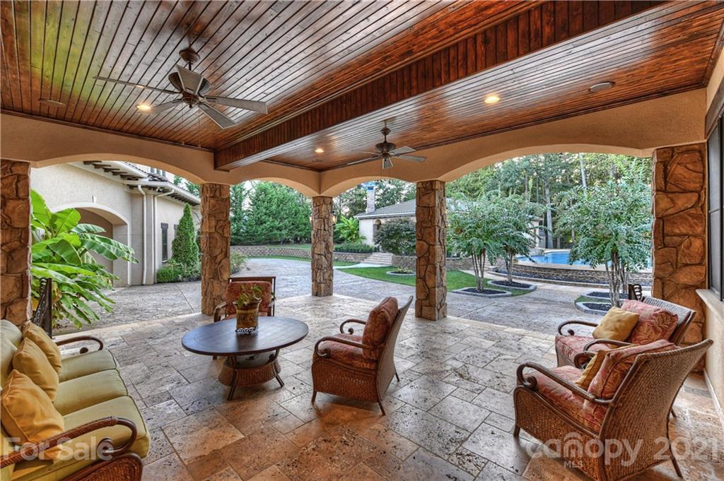 21123 Torrence Chapel Road Cornelius, NC 28031 - Photo 9 of 35 a outdoor living space with furniture and garden view