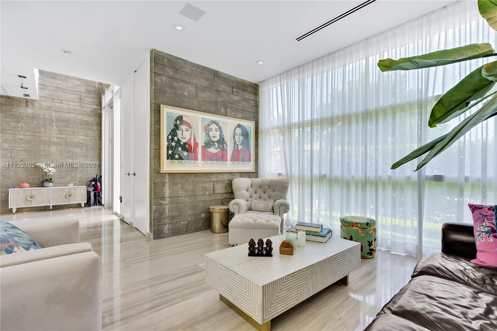 155 Hampton Lane Key Biscayne, FL 33149 - Photo 5 of 19 a living room with furniture