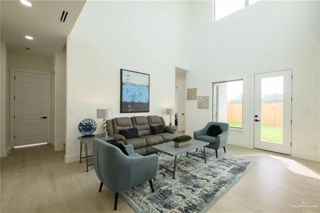 a living room with furniture and a couch