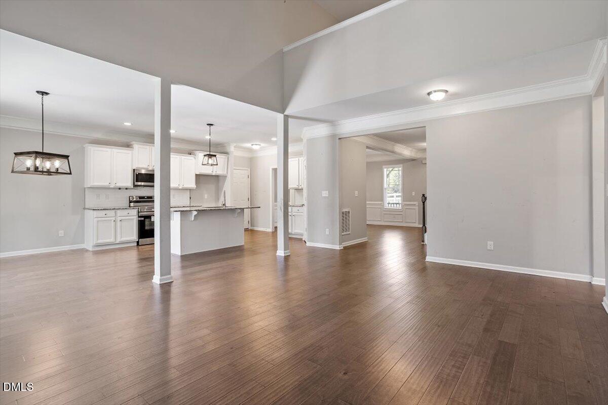 3361 Old Fairground Road Angier, NC 27501 - Photo 19 of 40 a view of a kitchen with a refrigerator and a stove top oven