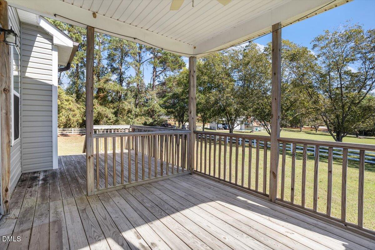 3361 Old Fairground Road Angier, NC 27501 - Photo 21 of 40 a view of balcony with wooden floor
