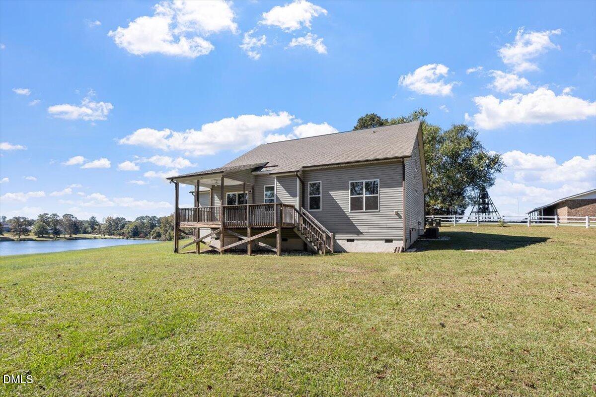 3361 Old Fairground Road Angier, NC 27501 - Photo 4 of 40 a view of a house with swimming pool and porch with furniture