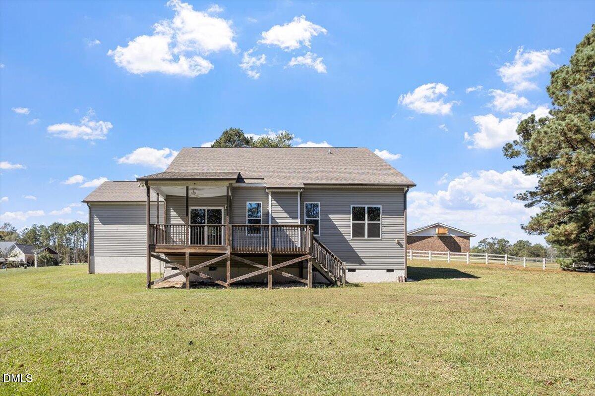 3361 Old Fairground Road Angier, NC 27501 - Photo 5 of 40 a view of a house with a yard and sitting area