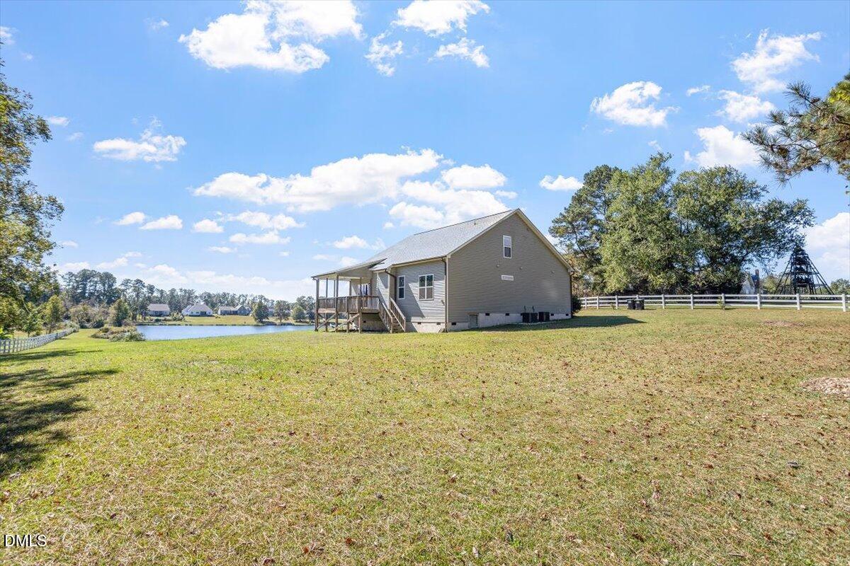 3361 Old Fairground Road Angier, NC 27501 - Photo 7 of 40 a view of a house with a big yard