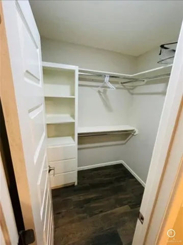 a storage room with wooden floor