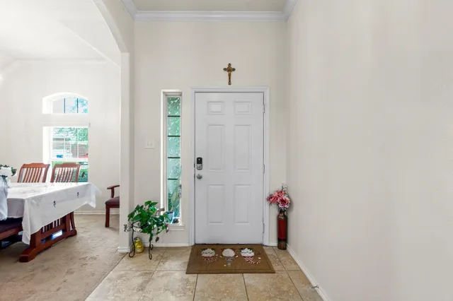 a bathroom with a tub and a shower