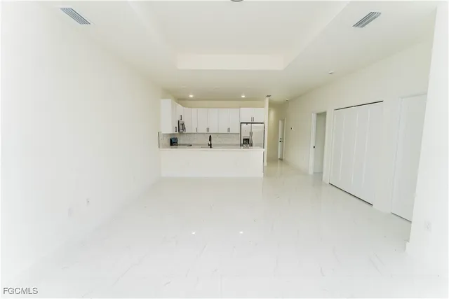 a view of a kitchen with a sink