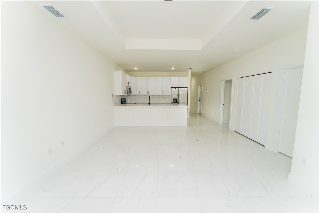 1171 Countess Avenue Lehigh Acres, FL 33974 - Photo 8 of 15 a view of a kitchen with a sink