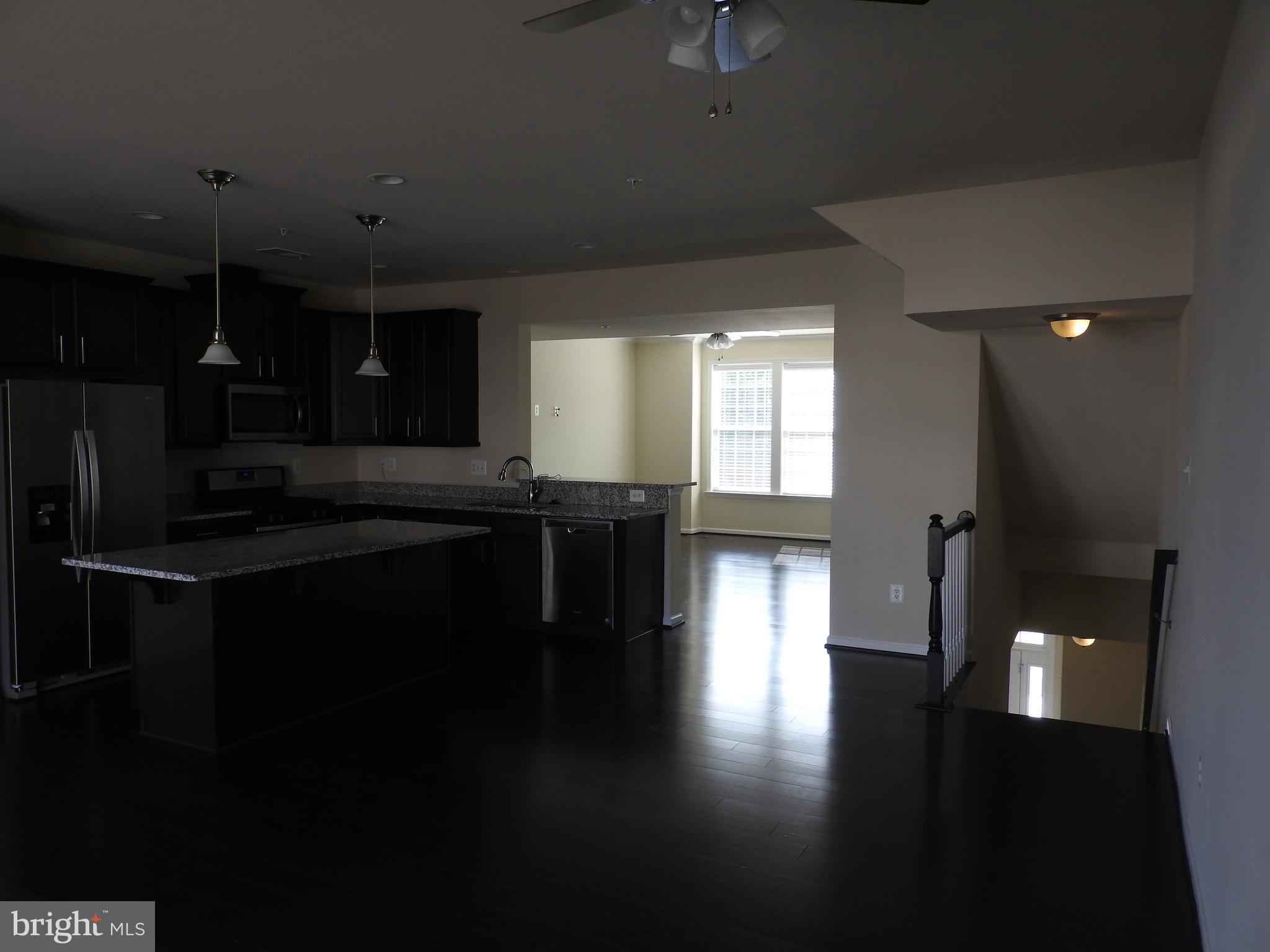 7863 Wormans Mill Road Frederick, MD 21701 - Photo 16 of 37 Kitchen/Dining/Family room area.