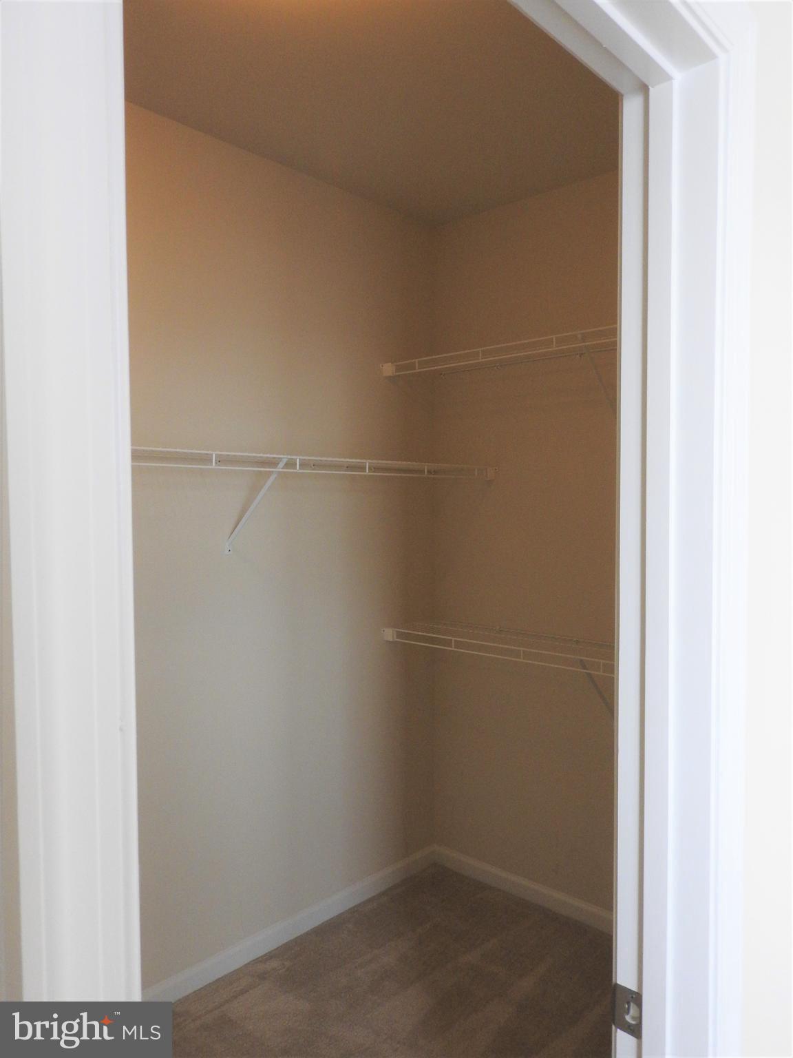 7863 Wormans Mill Road Frederick, MD 21701 - Photo 21 of 37 Master Bedroom walk-in closet.