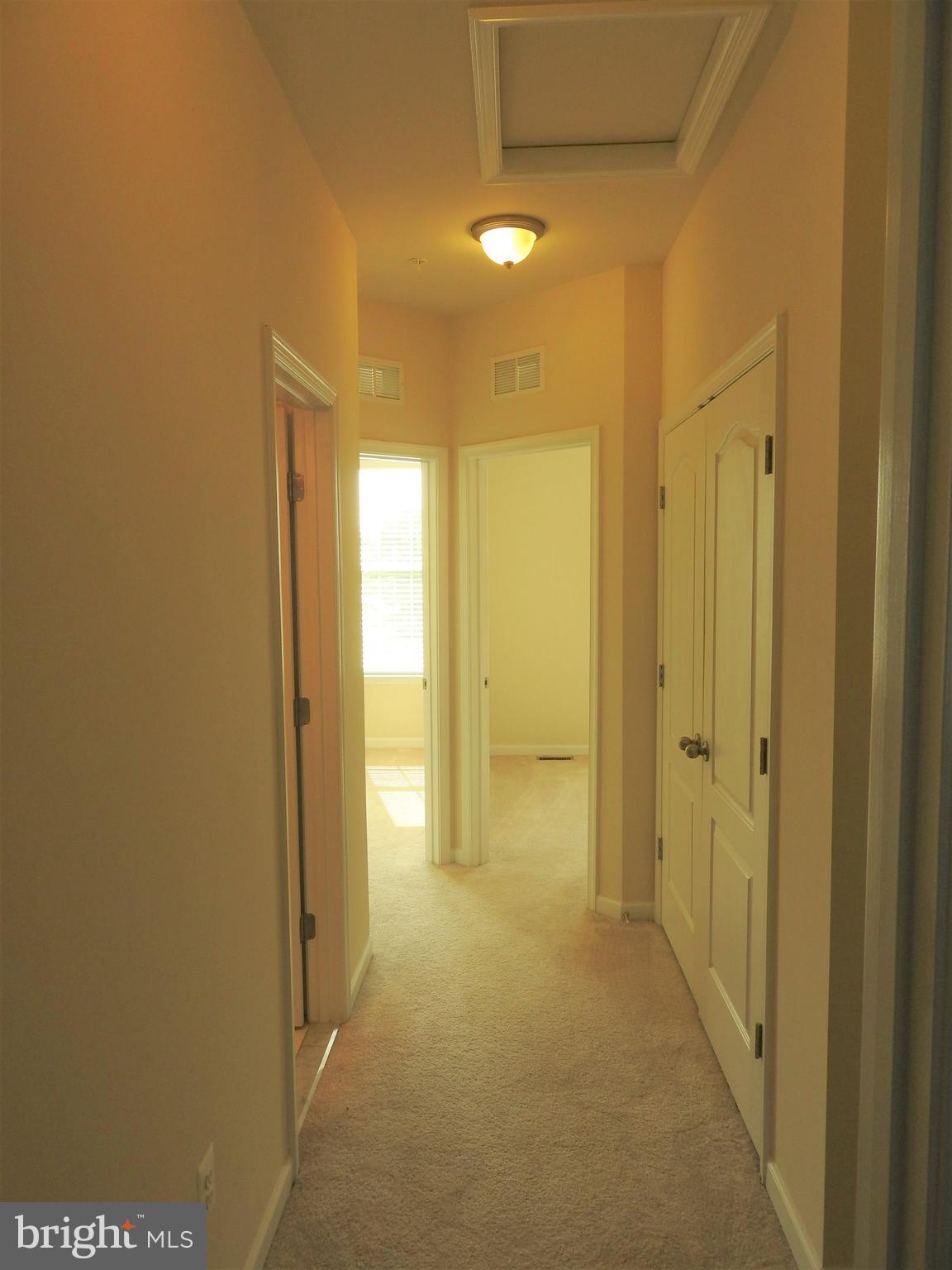 7863 Wormans Mill Road Frederick, MD 21701 - Photo 25 of 37 Upper level 2 hallway.