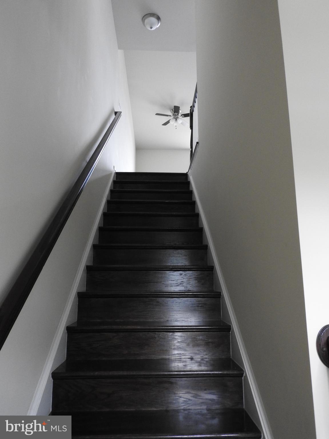 7863 Wormans Mill Road Frederick, MD 21701 - Photo 6 of 37 Stairs leading to upper level 1.