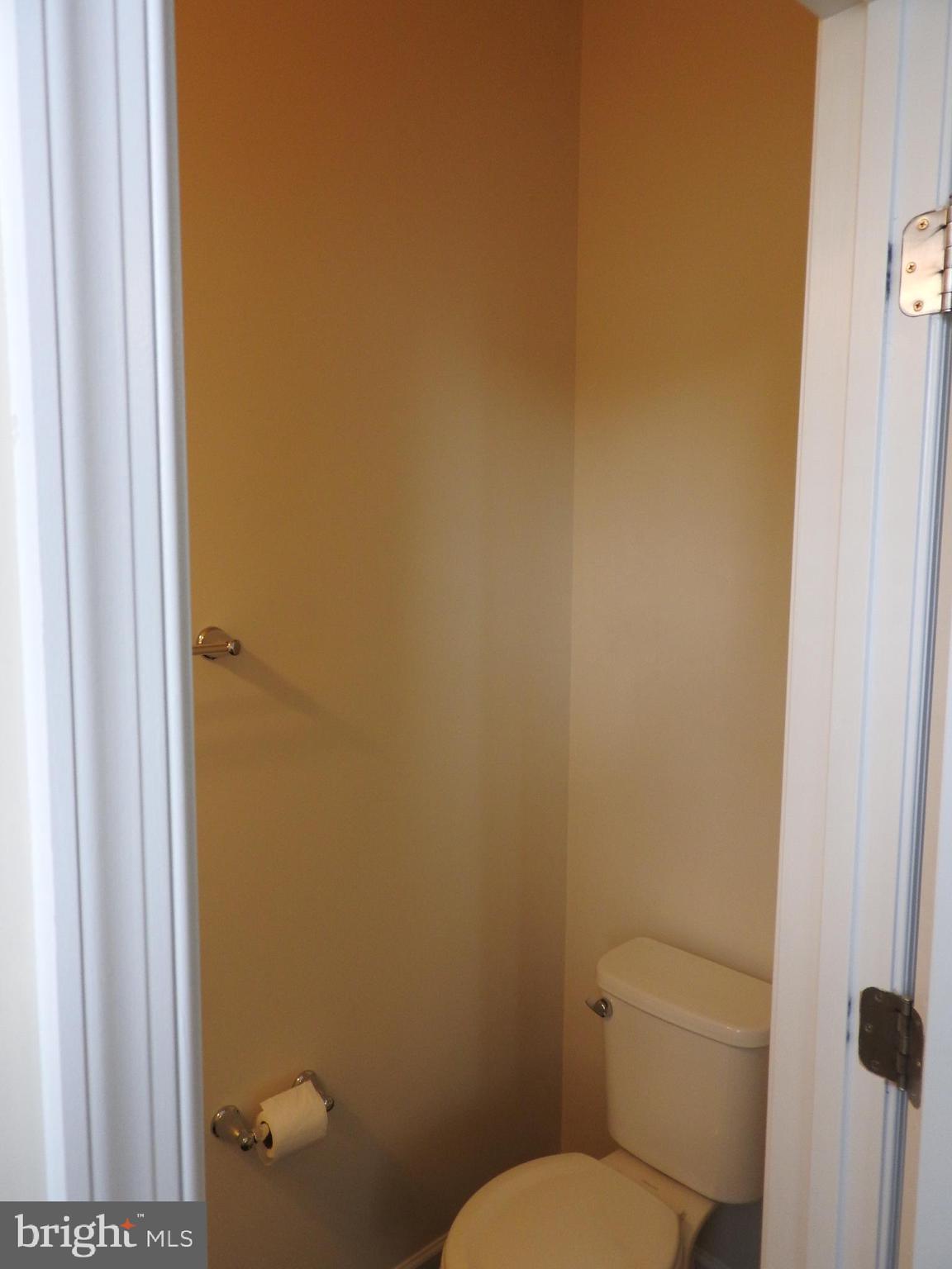 7863 Wormans Mill Road Frederick, MD 21701 - Photo 9 of 37 Half bath off family room.