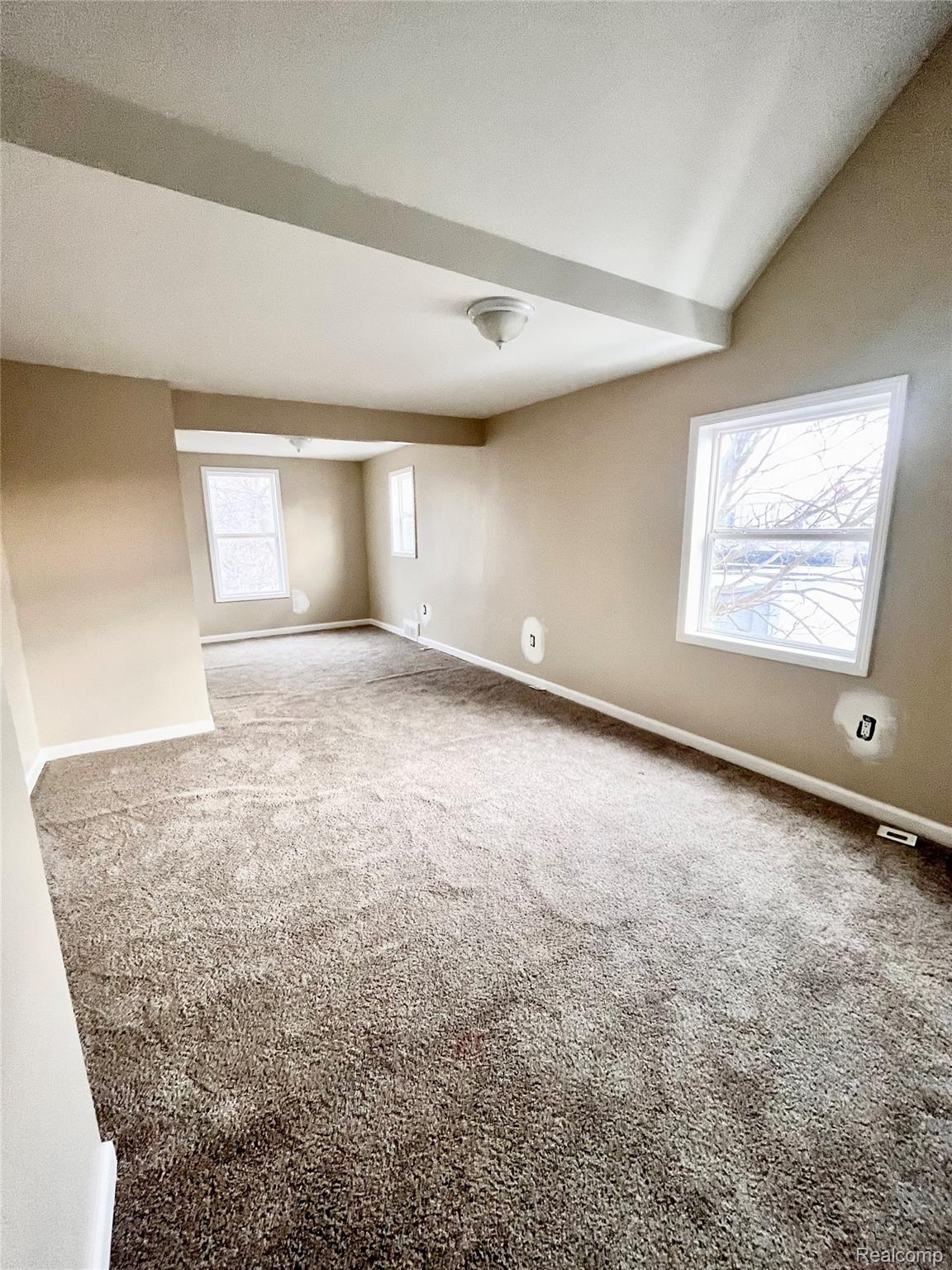 2410 Corunna Road Flint, MI 48503 - Photo 11 of 20 Carpeted spare room featuring plenty of natural light