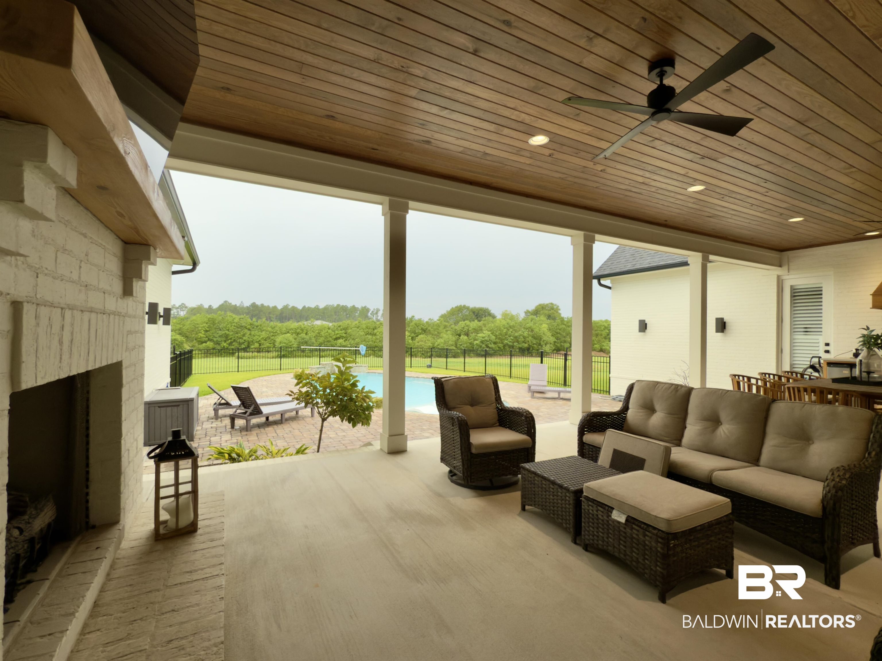 21767 Gallery Boulevard Fairhope, AL 36532 - Photo 62 of 74 Living room with ceiling fan, a fireplace, wooden ceiling, and recessed lighting