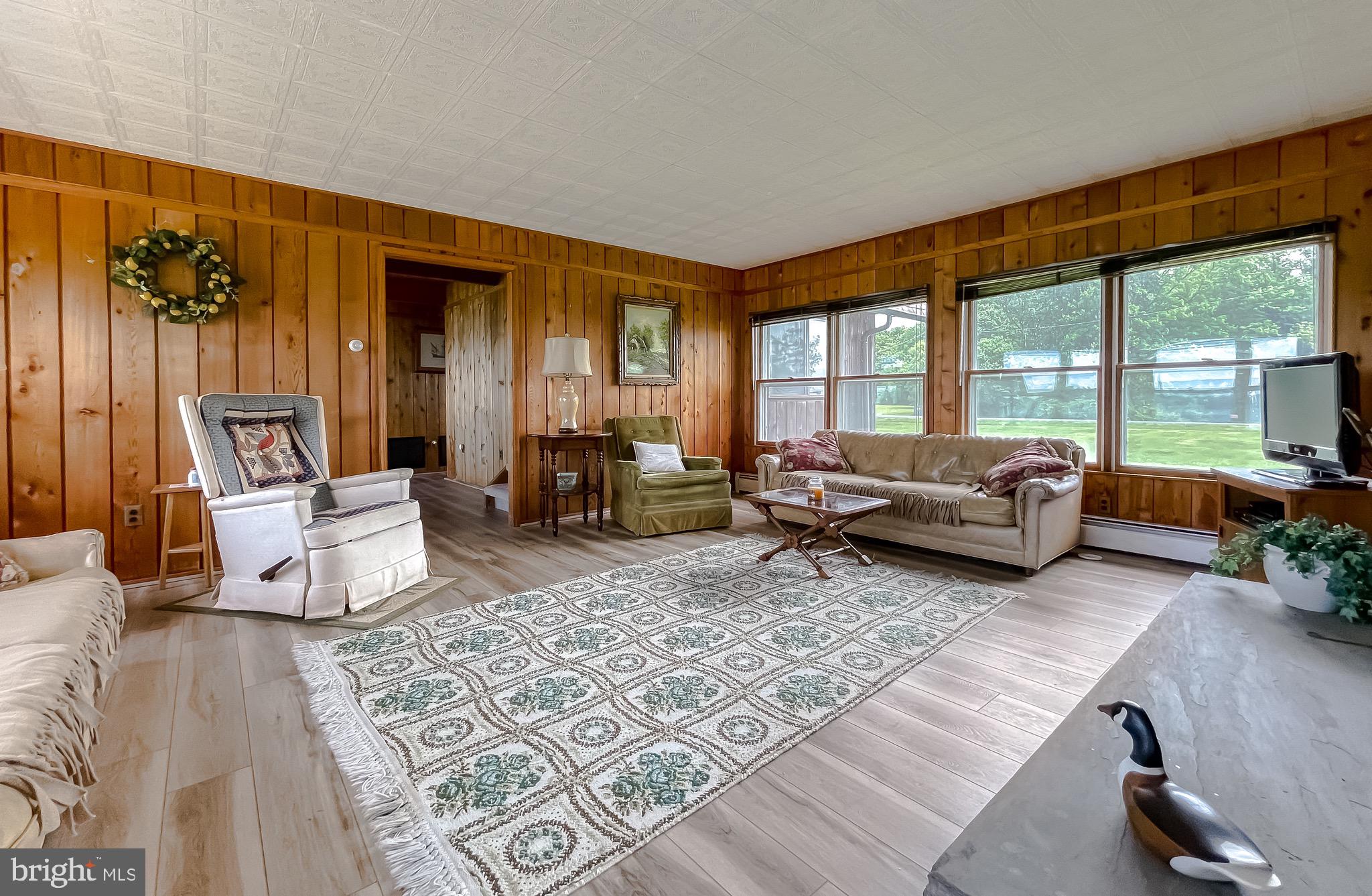 16721 St Jeromes Neck Road Dameron, MD 20628 - Photo 72 of 133 Large family room with wood burning fireplace
