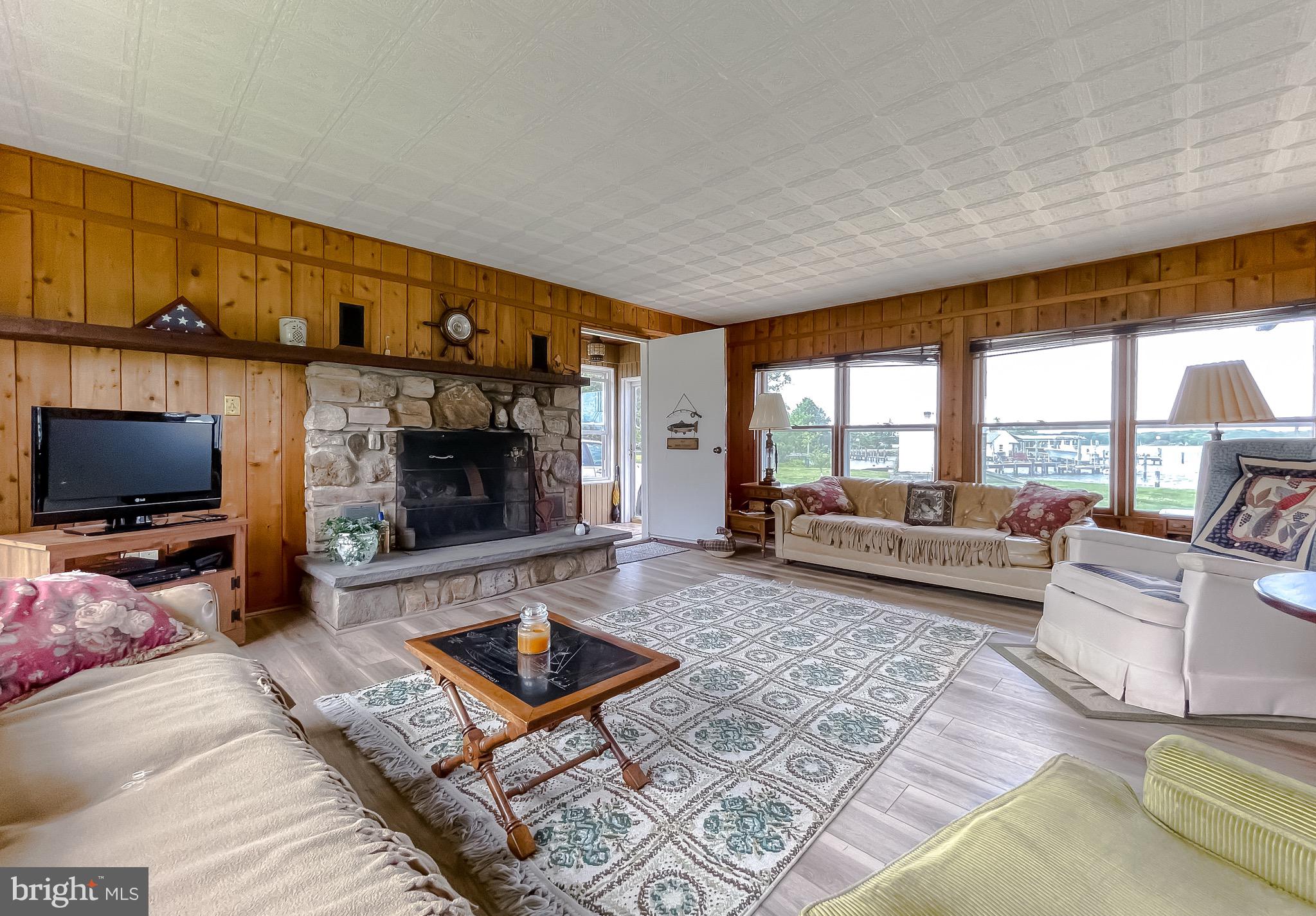 16721 St Jeromes Neck Road Dameron, MD 20628 - Photo 76 of 133 Large family room with wood burning fireplace