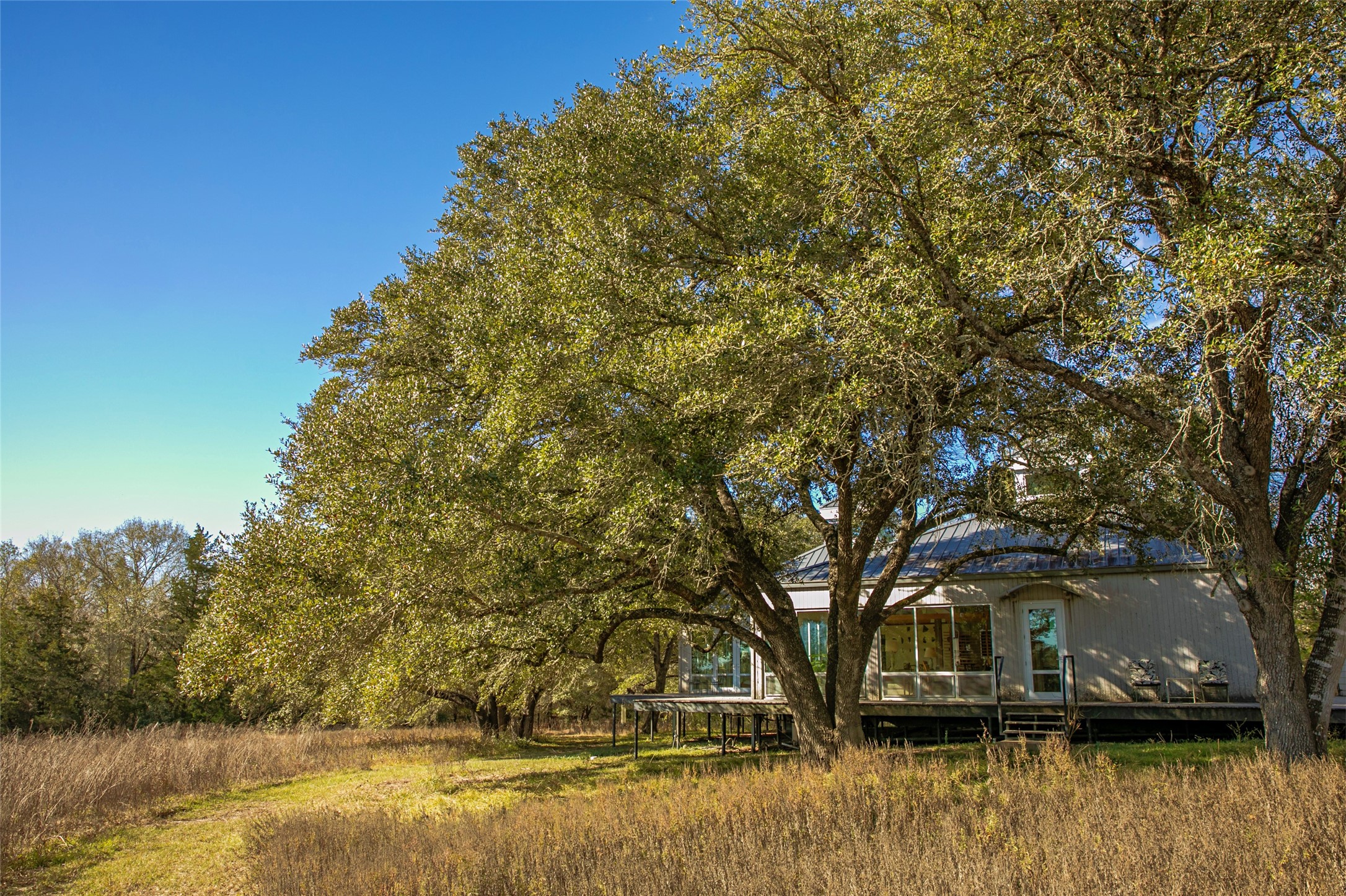 a view of house with outdoor space