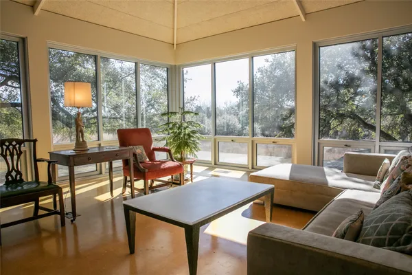 a living room with furniture and a window