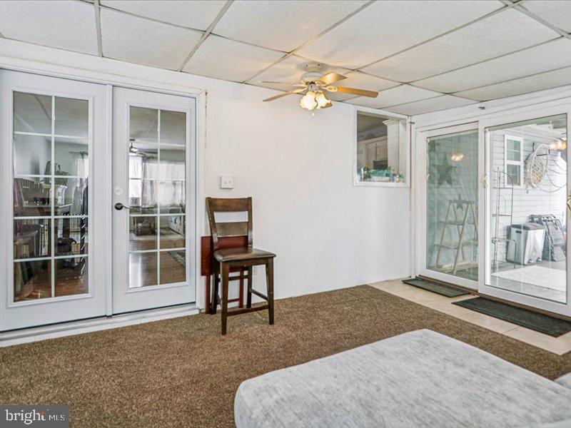 33 Musket Court Taneytown, MD 21787 - Photo 22 of 43 Sunroom w door to covered deck