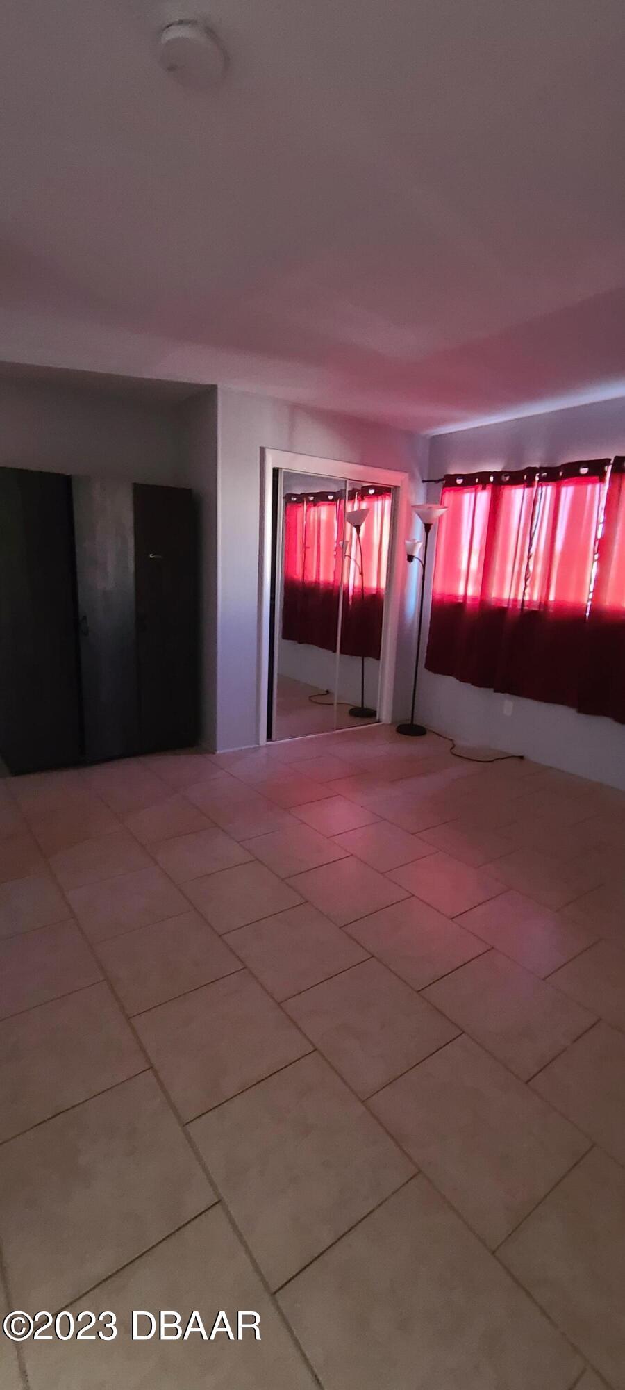 301 Ridge Boulevard, Unit 1020 South Daytona, FL 32119 - Photo 10 of 12 a view of empty room with windows